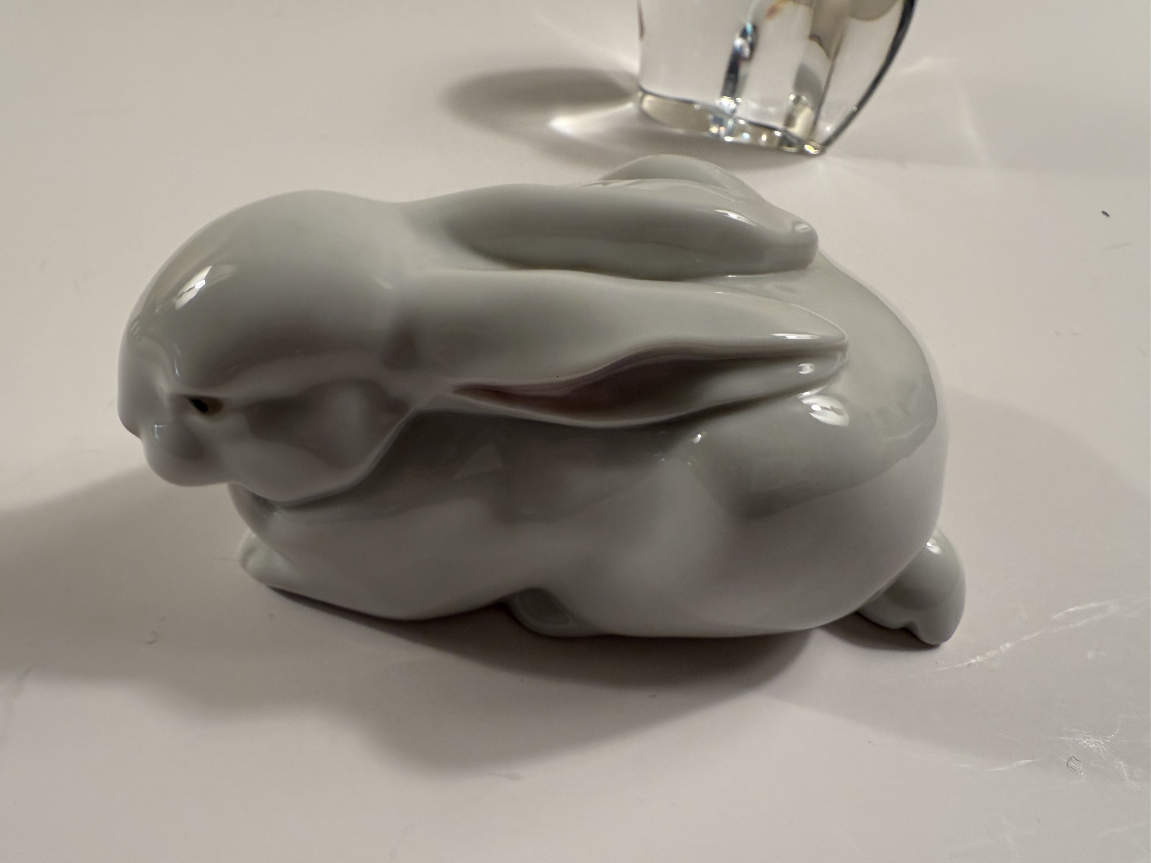 Lladró Bunny — Model 5904 "Sleeping Bunny" by Fulgencio Garcia, 1992 Grey-glazed resting rabbit,
